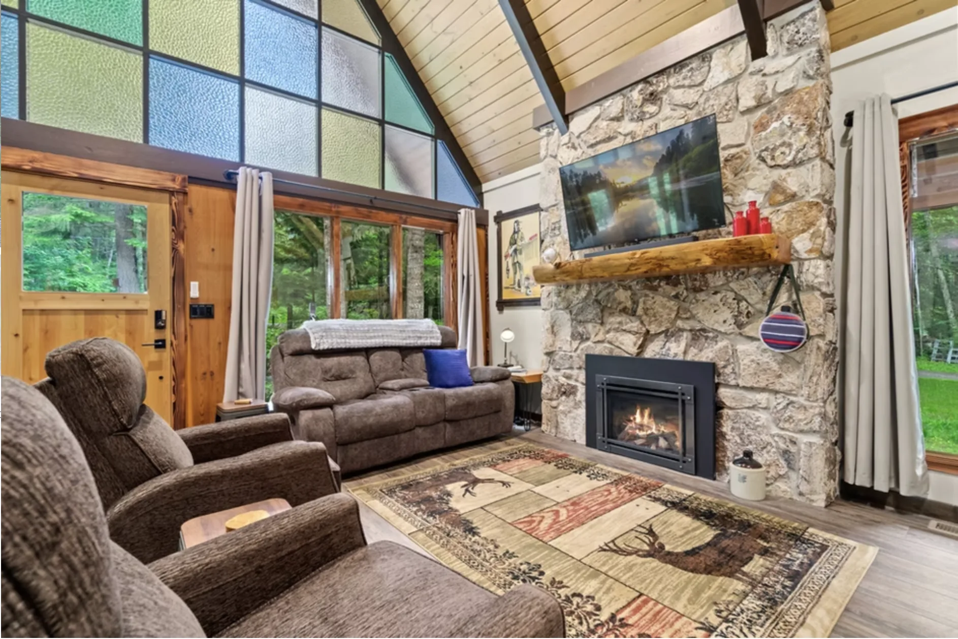 Stone fireplace in the great room at Redtail Rendezvous